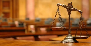 Symbol of law and justice in the empty courtroom, law and justice concept.