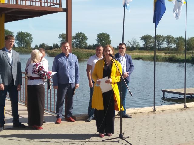 головна
